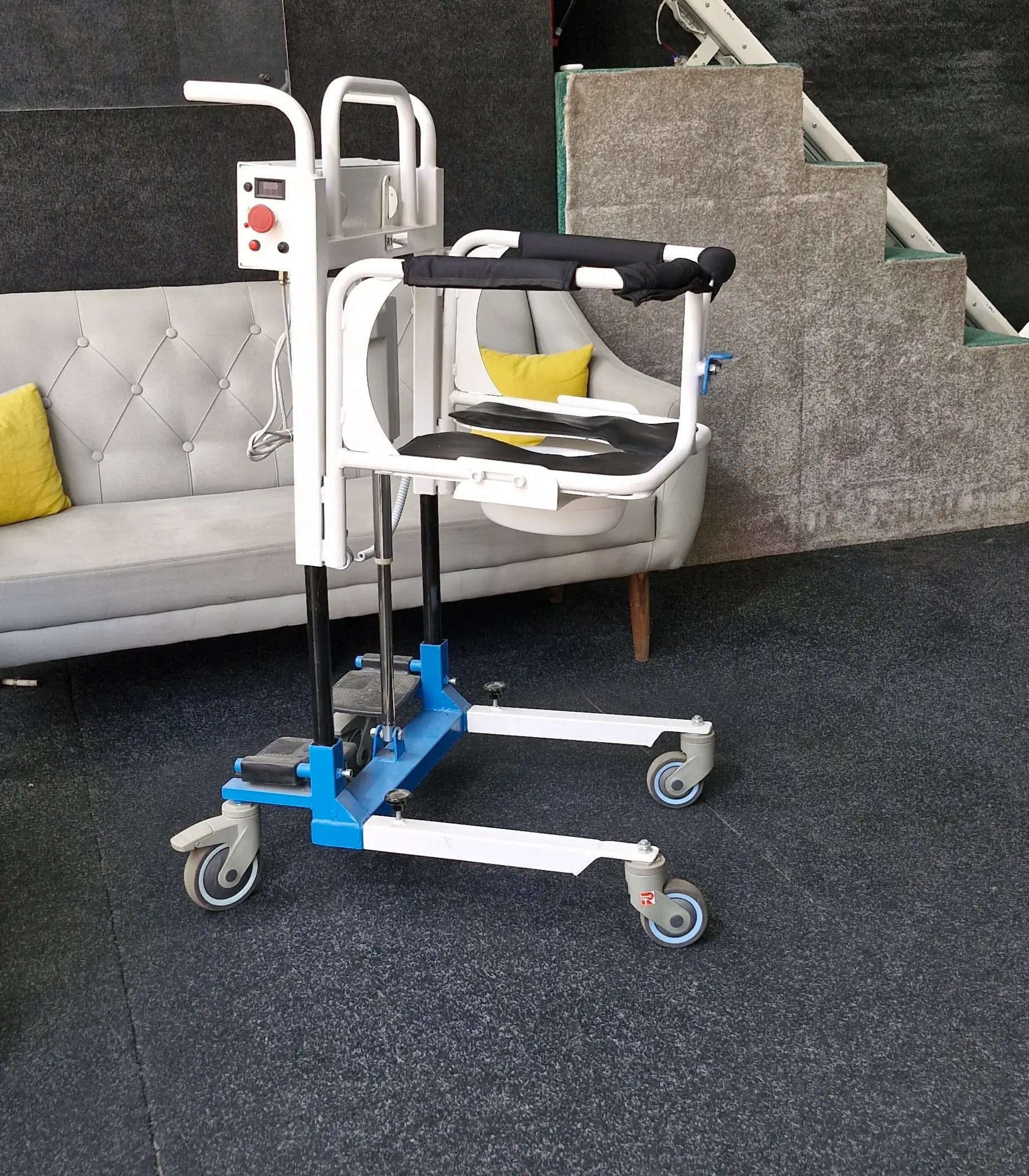 Mobile shower commode positioned over toilet with compact footprint